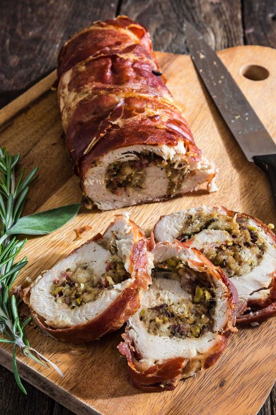 PROSCIUTTO WRAPPED TURKEY ROULADE WITH POMEGRANATE-PORT REDUCTION SAUCE