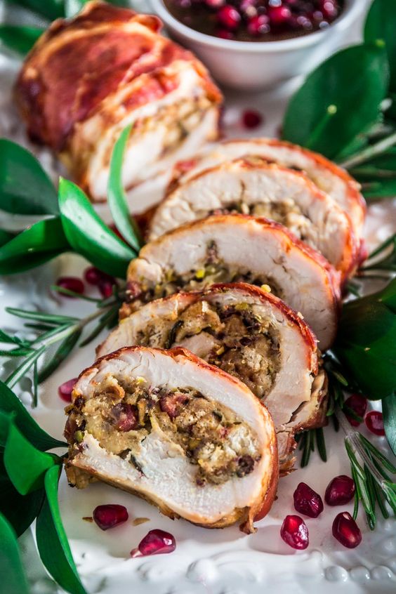 PROSCIUTTO WRAPPED TURKEY ROULADE WITH POMEGRANATE-PORT REDUCTION SAUCE