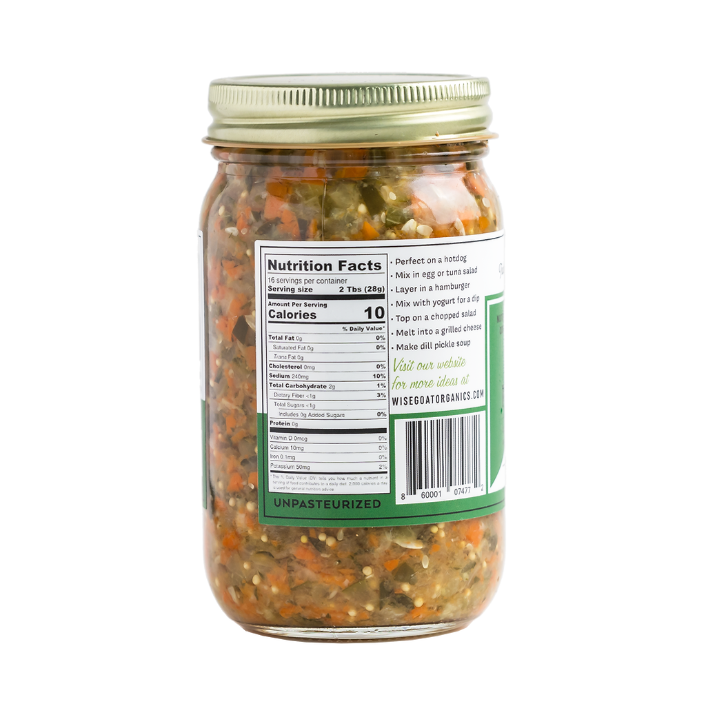A glass jar of Wise Garden Organic Chopped Vegetable Mix with a gold metal lid, showing the nutrition facts label on the back, set against a plain white background.